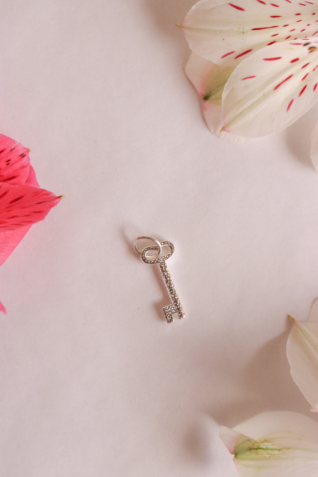 Key of Return Charm